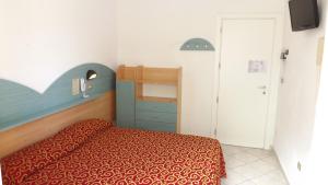 Postel nebo postele na pokoji v ubytování Hotel Alga