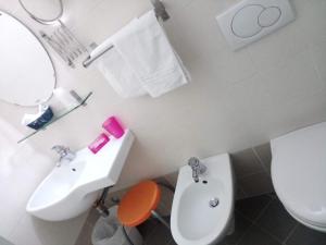 Koupelna v ubytování Hotel Alga