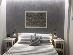 Кровать или кровати в номере Interno 1 Ciampino Roma Luxury Apartment