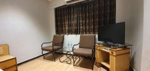 TV o dispositivi per l'intrattenimento presso Hotel JMC Group