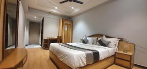 Letto o letti in una camera di Hotel JMC Group