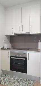 Kuchyňa alebo kuchynka v ubytovaní Apartment IBIZA STYLE