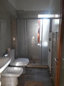 Um banheiro em Hotel Bujtina Bicolli