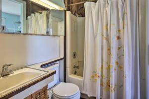 a bathroom with a sink and a toilet and a shower at Charming Tivoli Home with Patio, by Town and Shops in Tivoli +22 photos
