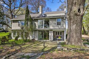an old house with a tree in front of it at Charming Tivoli Home with Patio, by Town and Shops in Tivoli