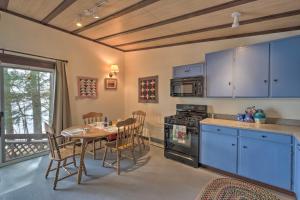 A kitchen or kitchenette at Lakefront Hartford Cabin with Canoe and Boat Ramp
