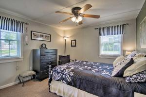 A bed or beds in a room at Charming Painter Home with Chesapeake Bay Views