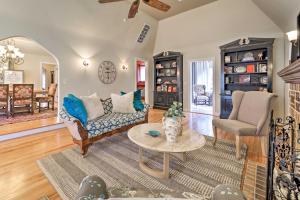 a living room with a couch and a table at Historic Oklahoma City Home, 5 Mi to Downtown in Oklahoma City