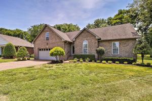 a large brick house with a driveway at Gallatin House on Long Hollow Golf Course! in Gallatin