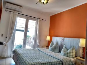 A bed or beds in a room at carpe Diem