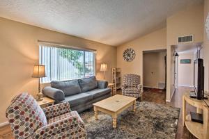 a living room with a couch and chairs at S Cottonwood Home with Yard, 3 Mi to Main St in Cottonwood