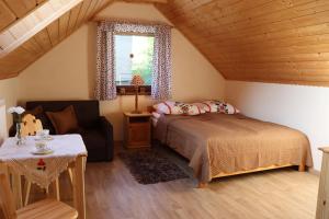 Posteľ alebo postele v izbe v ubytovaní Apartamenty ''Chcę Tu Zostać''