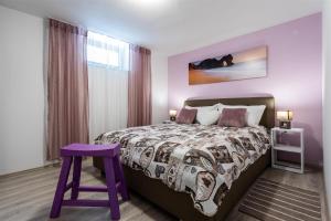 Postel nebo postele na pokoji v ubytování Apartment Roko + 12 fotografií