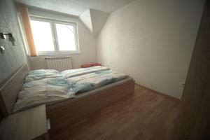 Posteľ alebo postele v izbe v ubytovaní Apartment Imka