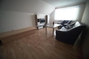 Televízia a/alebo spoločenská miestnosť v ubytovaní Apartment Imka