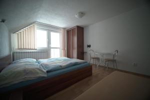 Posteľ alebo postele v izbe v ubytovaní Apartment Imka + 19 fotografií