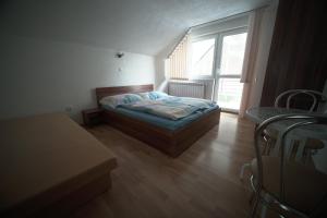 Posteľ alebo postele v izbe v ubytovaní Apartment Imka