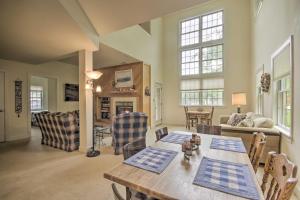 a living room with a table and chairs at Spacious Mercersburg Home at Whitetail Resort in Clear Spring