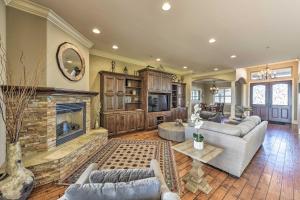 a living room with couches and a fireplace at Near Wineries Elk Grove Getaway with Saltwater Pool in Elk Grove