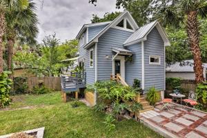 a blue tiny house with a porch at Downtown St Augustine, The Lincolnville Loft in Saint Augustine