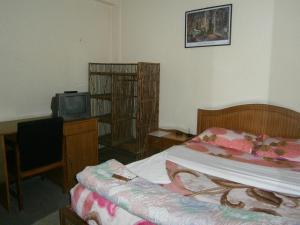 Televisyen dan/atau pusat hiburan di Hotel Red Planet