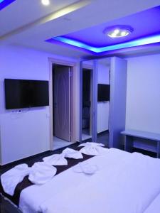 Postel nebo postele na pokoji v ubytování KILIÇ MOTEL