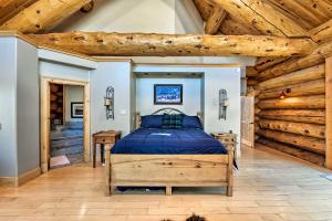 a bedroom with a bed and a wooden ceiling at 22STR-00019 Fairplay Cabin with Hot Tub and Sauna in Fairplay