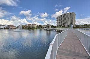 a bridge over a body of water with a building at Destin Townhome with Beach Access & 2 Pools! in Destin
