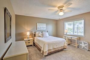 a bedroom with a bed and a ceiling fan at Destin Townhome with Beach Access & 2 Pools! in Destin +27 photos
