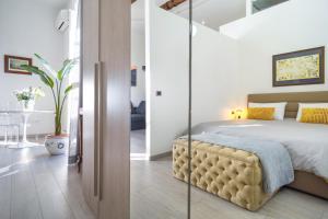 Säng eller sängar i ett rum på B1flat Mergellina - Napoli