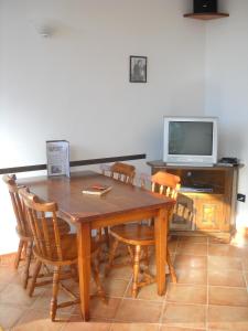 A television and/or entertainment centre at Charlie Chaplin Még 14 kép
