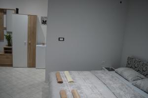 Postel nebo postele na pokoji v ubytování MAGIC M Apartment