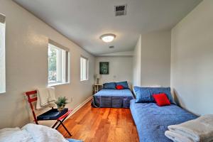 a living room with a couch and a bed at Ottawa Lake Home with BBQ and Patio, 15 Mi to Toledo in Sylvania
