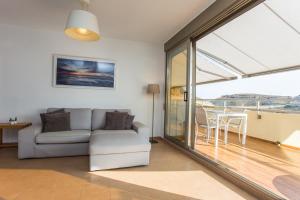 Posezení v ubytování 4-Seasons Penthouse Cullera