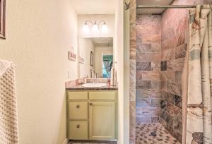 a bathroom with a sink and a shower at Half-Mi to Seadrift Harbor Seadrift Home with Deck in Seadrift +18 photos