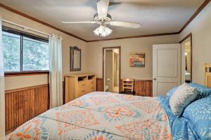 a bedroom with a bed and a ceiling fan at Dallas Area Home with Pool - 18 Mi to ATandT Stadium! in Duncanville