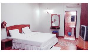 TAWAN RESORT客房内的一张或多张床位