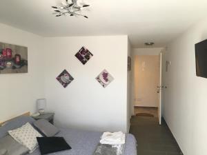 TV a/nebo společenská místnost v ubytování Casa di Emma