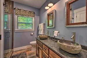 a bathroom with two sinks and a toilet at Hiawassee Home with Views Less Than 1 Mi to Lake Chatuge in Hiawassee +22 photos