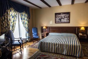 Postel nebo postele na pokoji v ubytování Hotel Spa Tudanca Aranda + 37 fotografií