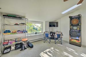 a room with two stools and a wheel machine at Deck and Fire Pit Waterfront Lake Michigan Escape in Algoma