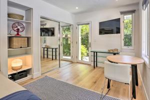 a living room with a table and a dining room at Menlo Park Studio about 2 Mi to Stanford University in Menlo Park