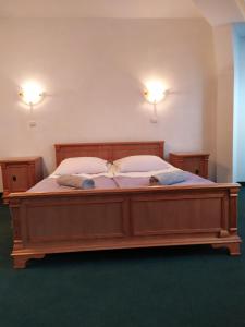 
Łóżko lub łóżka w pokoju w obiekcie Dom Turysty
