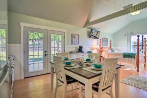 a kitchen and dining room with a table and chairs at Ranch Cabin with Decks, 10 Mi to Fredericksburg in Fredericksburg