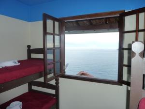 Postelja oz. postelje v sobi nastanitve Vidigal Varandas Hostel