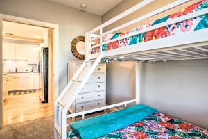 a bunk bed in a bedroom with a bunk bed in a room at Grand Haven Condo Walk to Lake and Pool Access! in Grand Haven