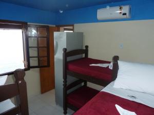 Postelja oz. postelje v sobi nastanitve Vidigal Varandas Hostel