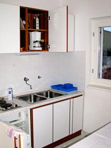 Η κουζίνα ή μικρή κουζίνα στο Ljiljana Apartment +39 φωτογραφίες