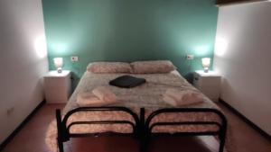 Postel nebo postele na pokoji v ubytování Albergo Diffuso di Campolattaro