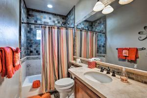 a bathroom with a sink and a toilet and a shower at Truckee Escape with Hot Tub Near Ski Resorts in Truckee +19 photos